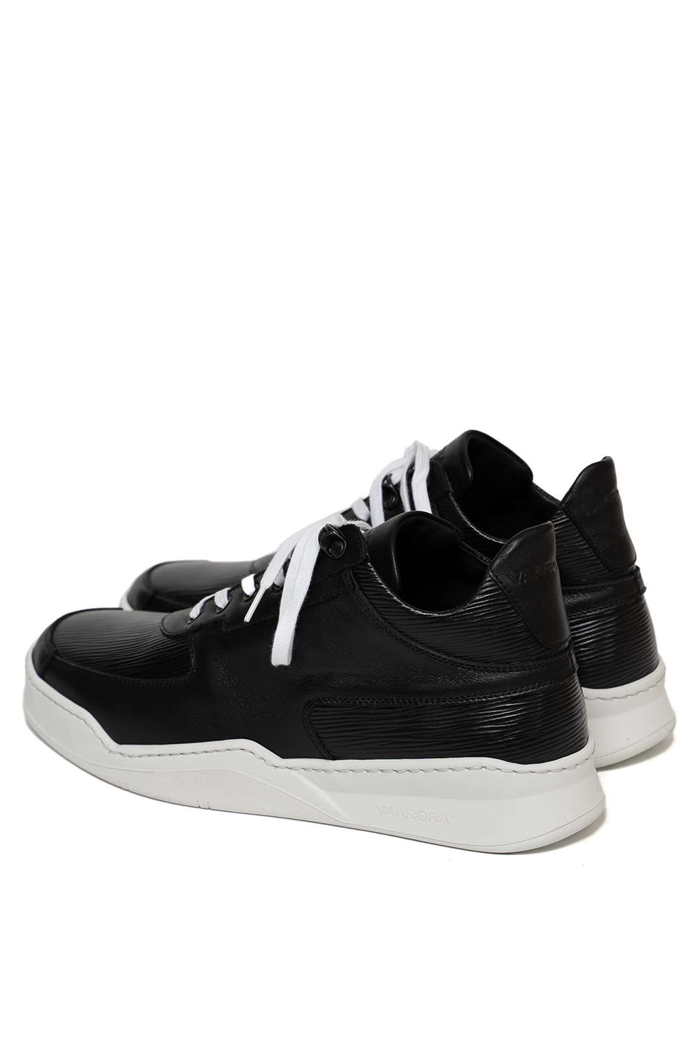Back view of the Vaarora Aurel Mid Top handmade premium leather sneaker in black highlighting the ribbed texture and white sole