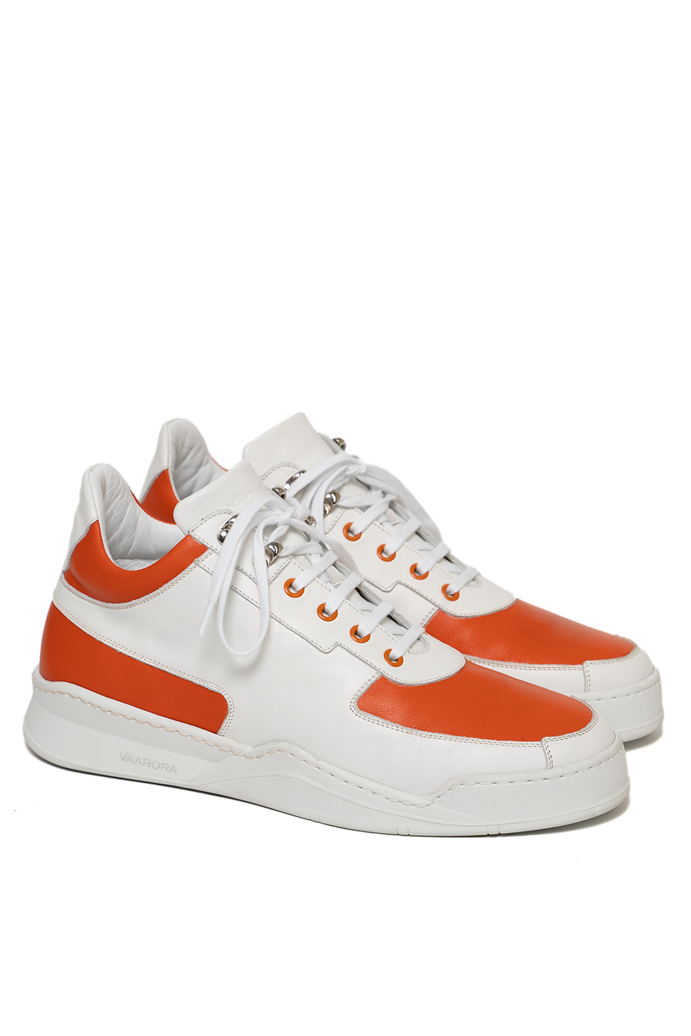 Side view of the Vaarora Aurel Mid Top luxury sneaker featuring white leather, orange paneling, and a heavy-weight rubber sole
