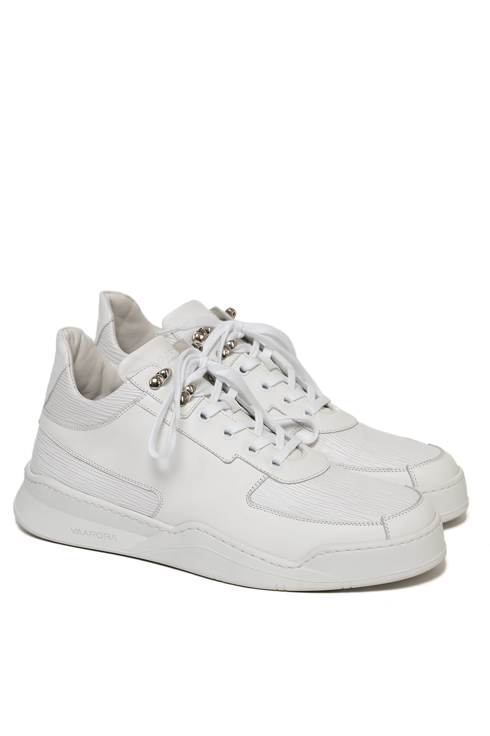 Side view of the Vaarora Aurel Mid Top sneaker showcasing the mix of smooth and textured white leather with a heavy-weight rubber sole