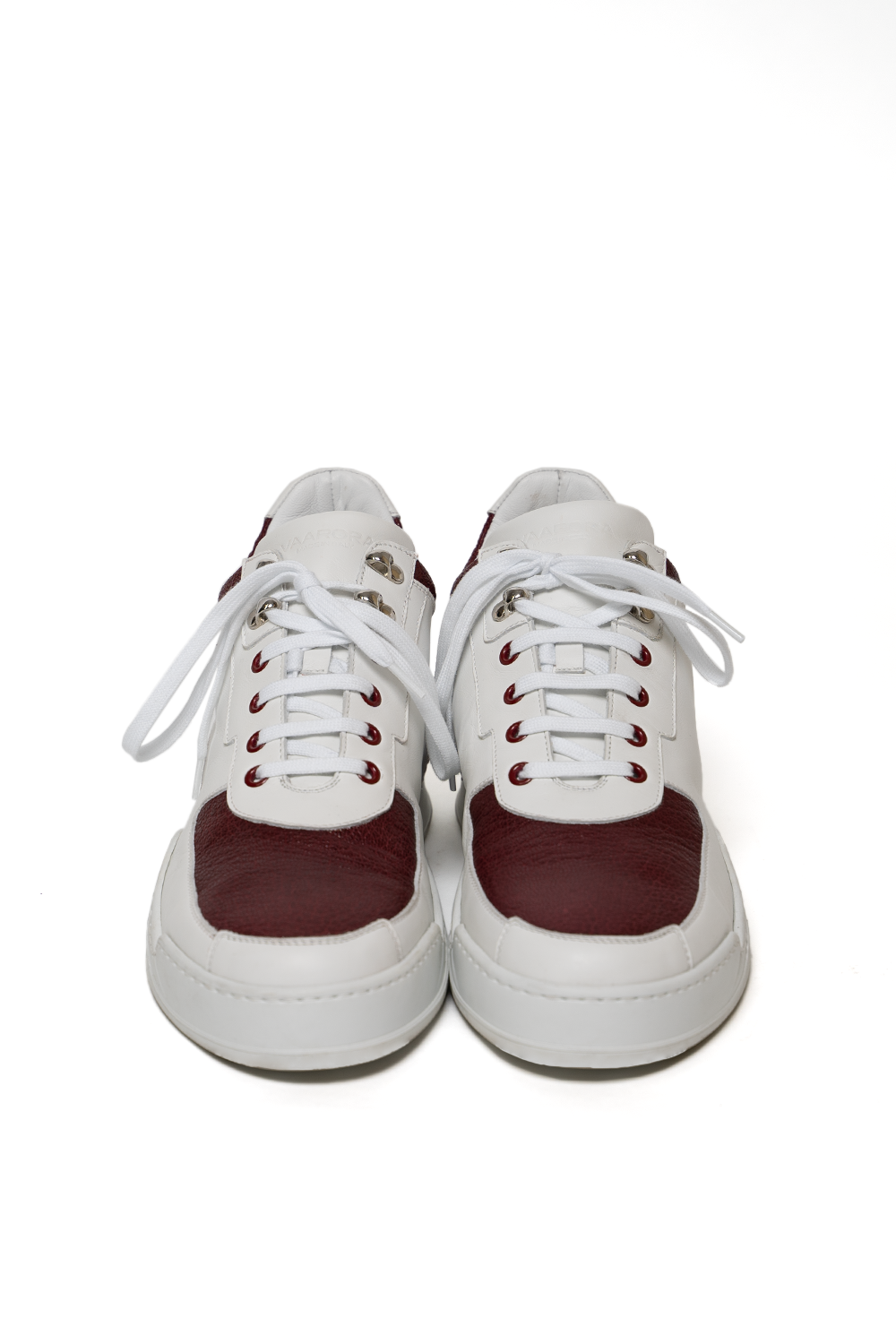 Front view of the Vaarora Aurel Mid Top handmade premium leather sneaker in white and vino red
