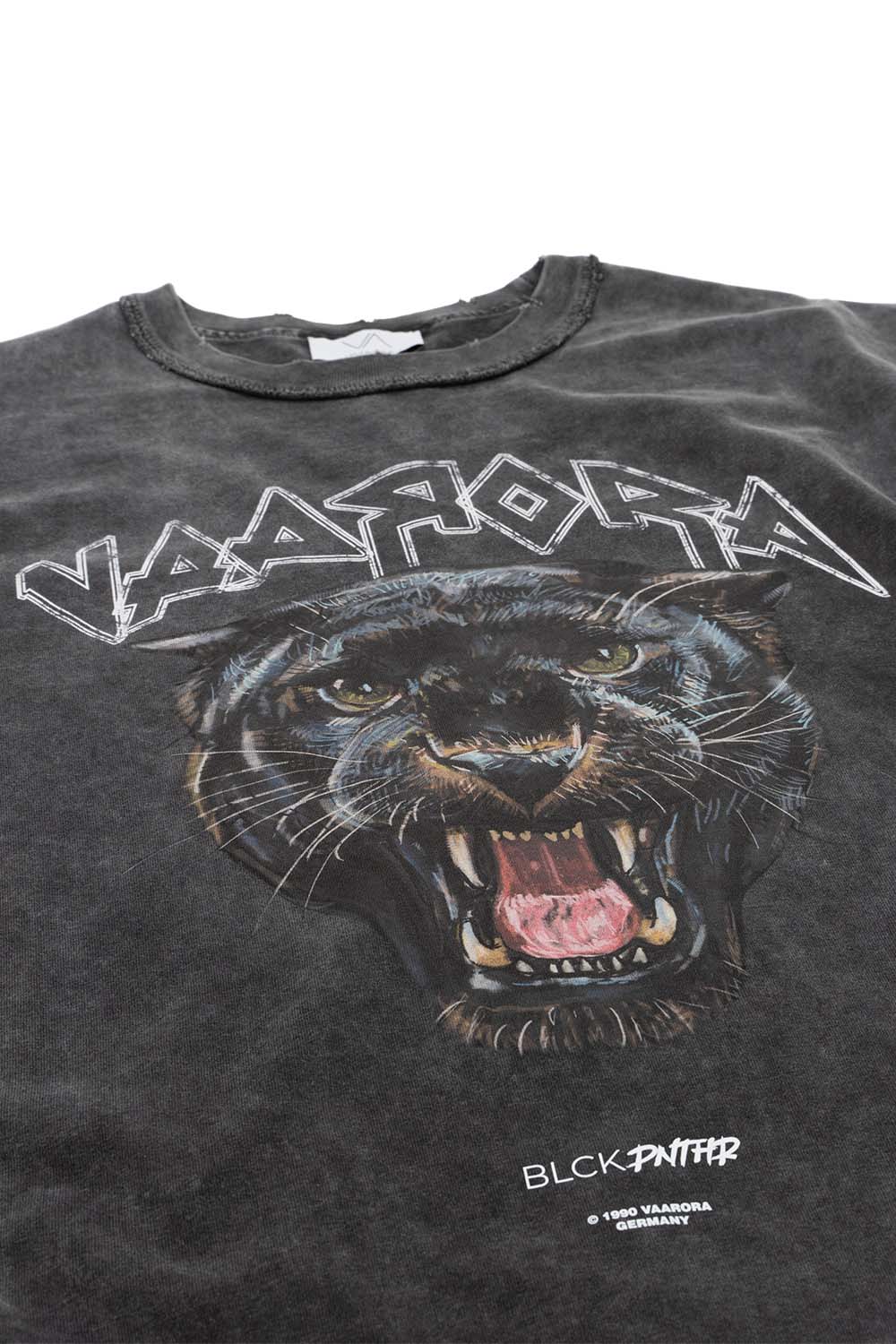 Close-up of the fierce black panther graphic and stylized Vaarora typography on the vintage grey heavy tee